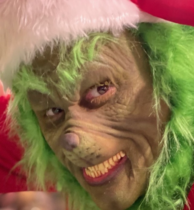 The Diamondback Grinch with a tray of green jello shots