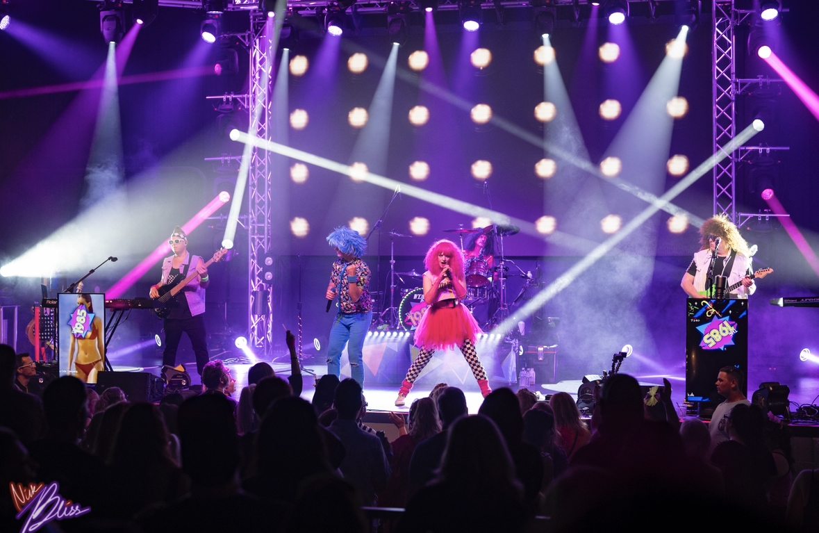The 1985 performing live with full lighting and video production