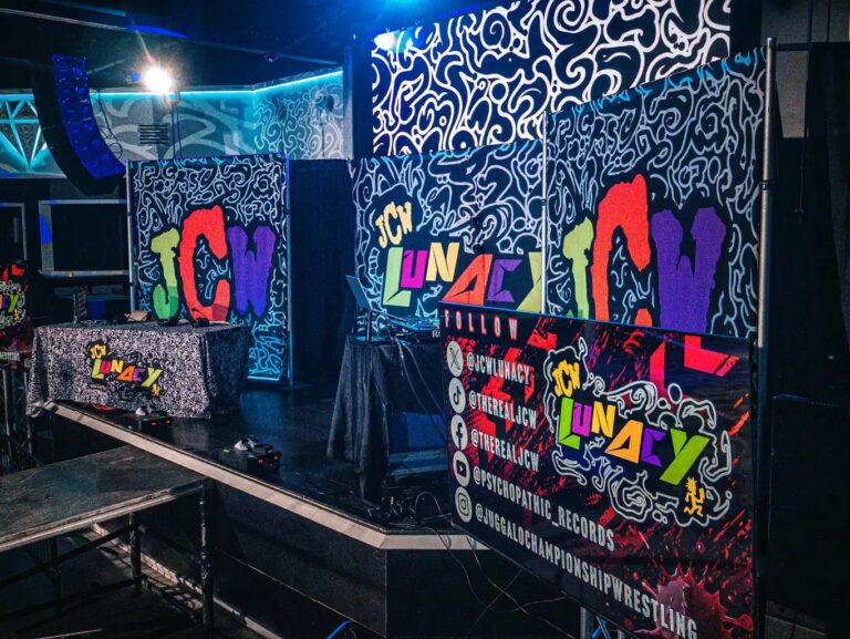 JCW Lunacy banners and ringside setup at Diamondback