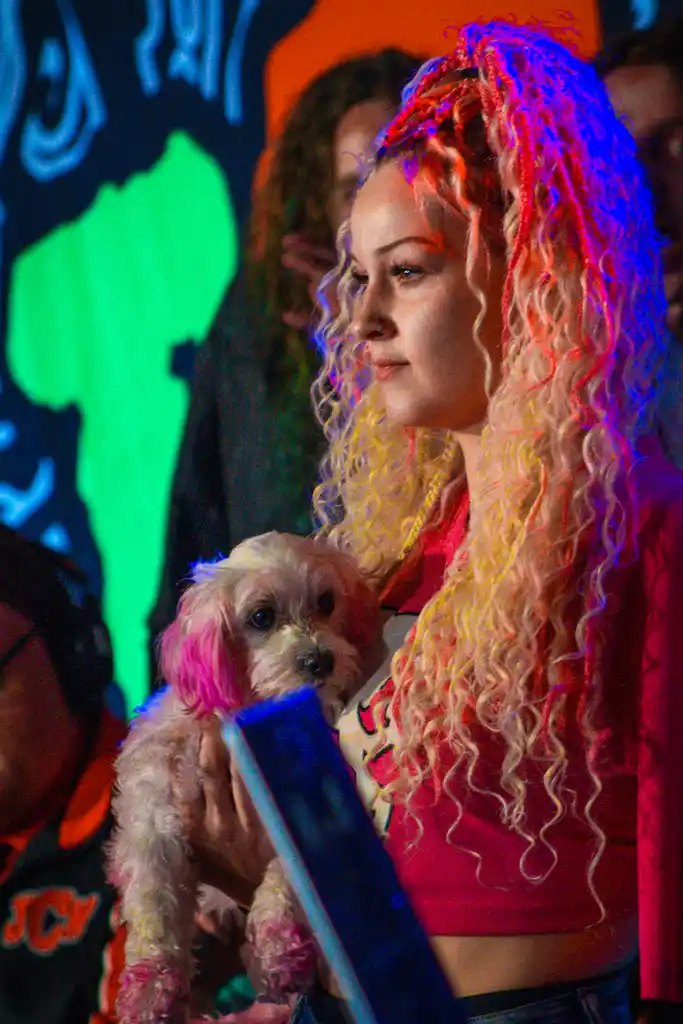 Wrestler with her dog at ringside