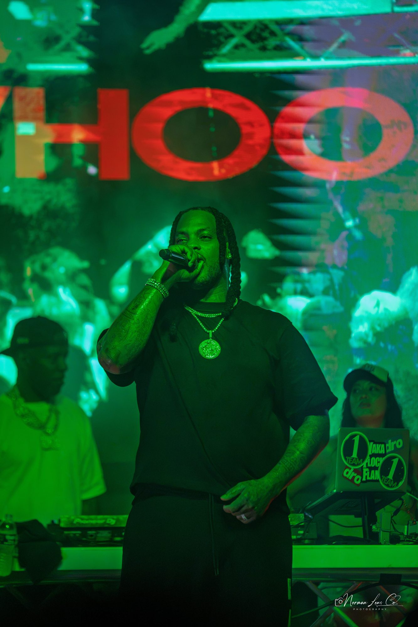 Waka Flocka Flame performing under green lights at Diamondback Music Hall